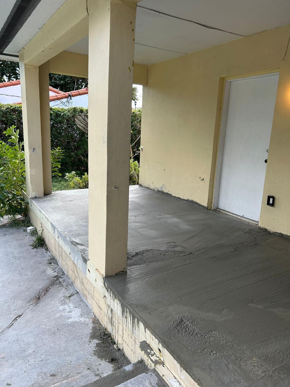 Covered porch slab, 20 NE 104 St
