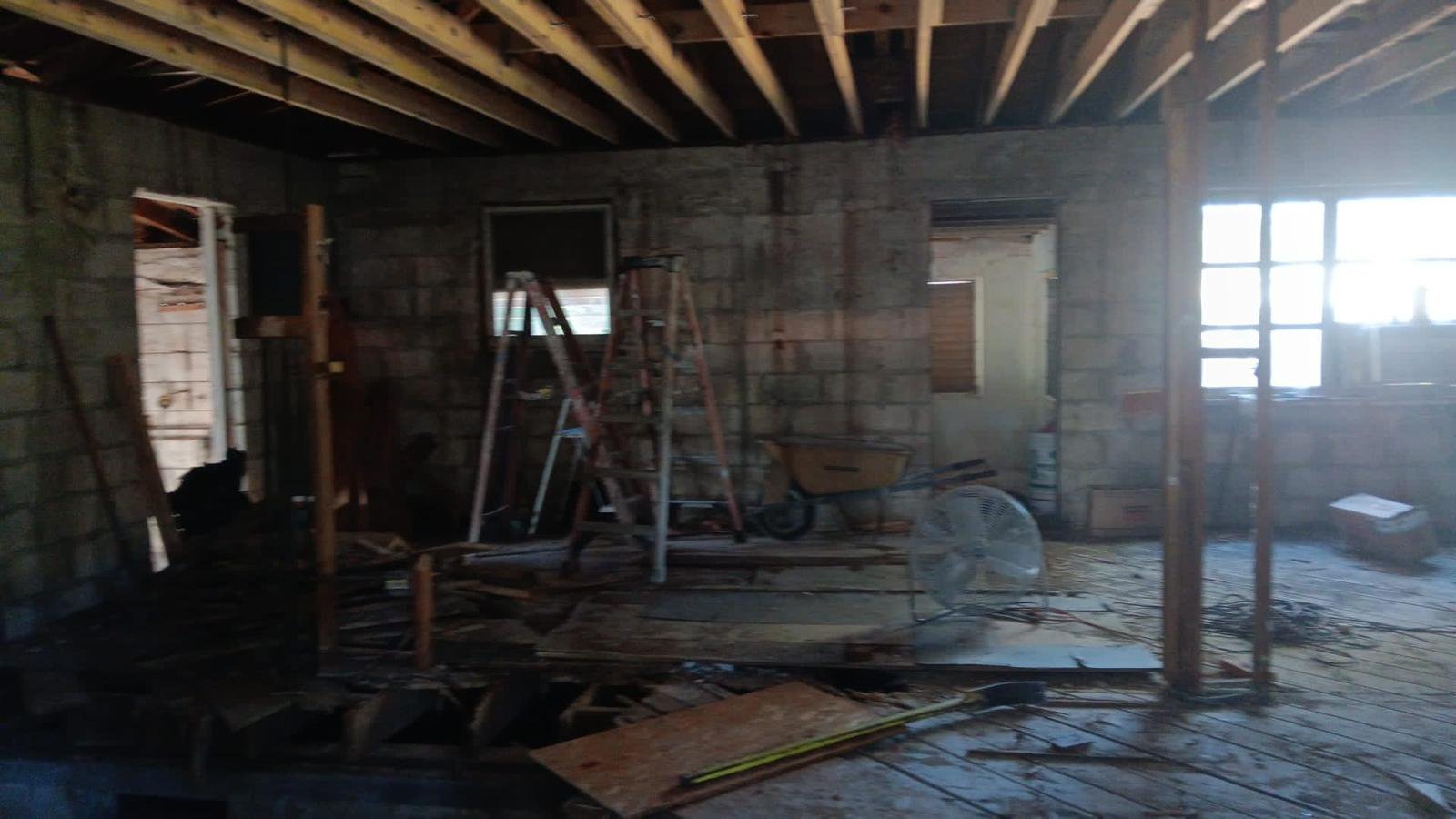 Main living area stripped to the block walls, 53 NW 107 St