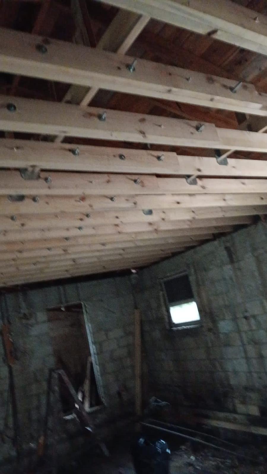 Roof structure exposed from below, 53 NW 107 St