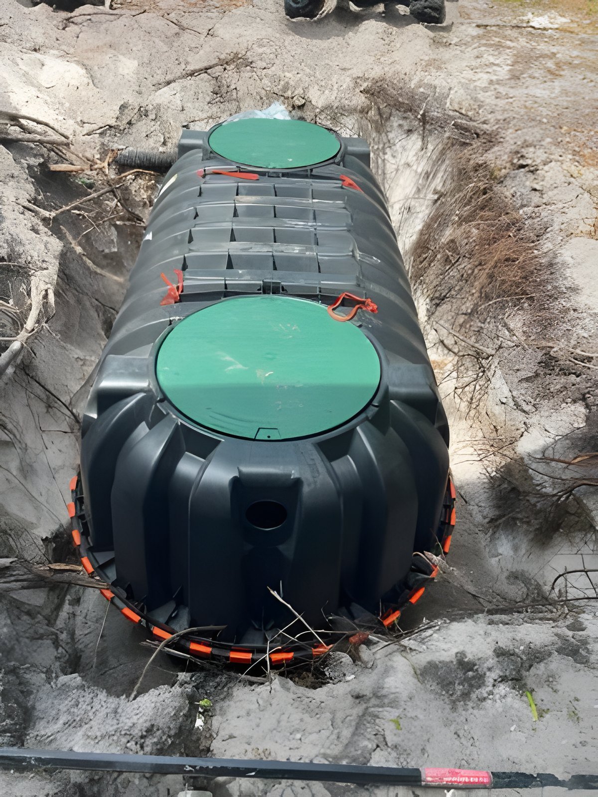 Septic tank set in the excavation, 53 NW 107 St