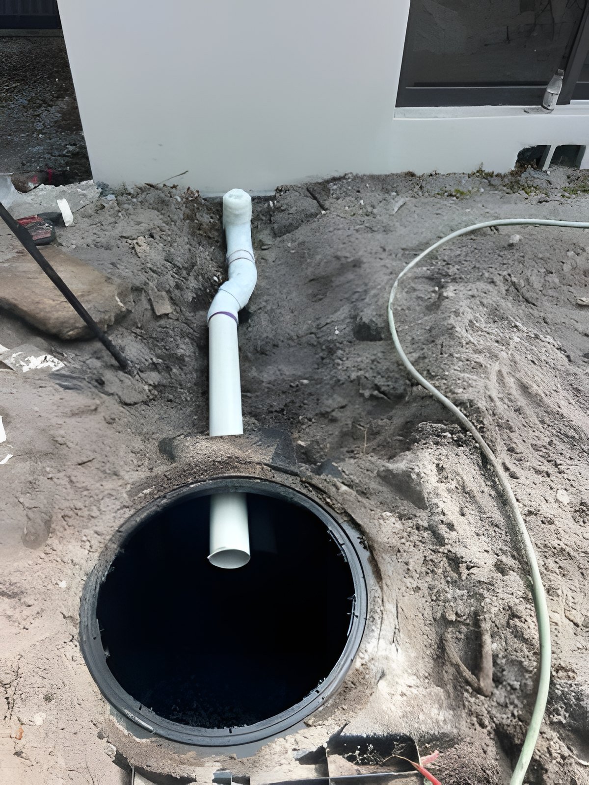 Septic access riser and plumbing, 53 NW 107 St