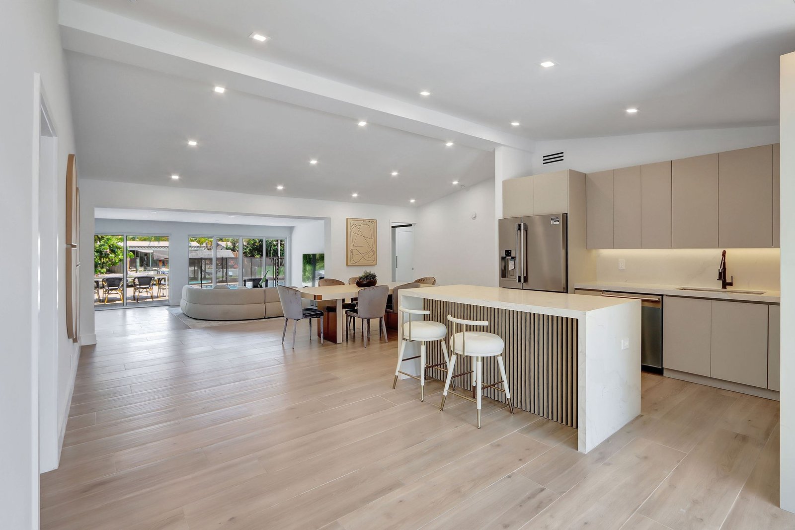 Open-concept living, dining and kitchen