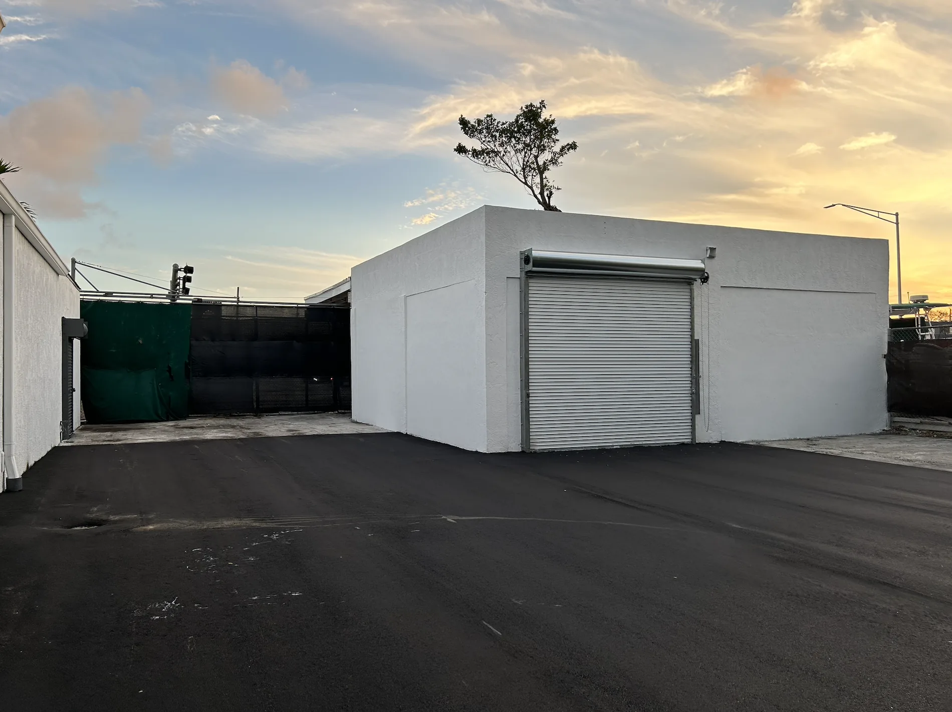 Warehouse with roll-up door at 79 Little River